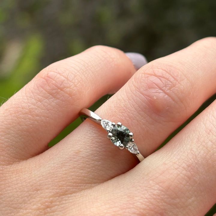 Elspeth - Round Brilliant Cut Teal Sapphire Trilogy Engagement Ring Engagement Rings - Made-to-Order