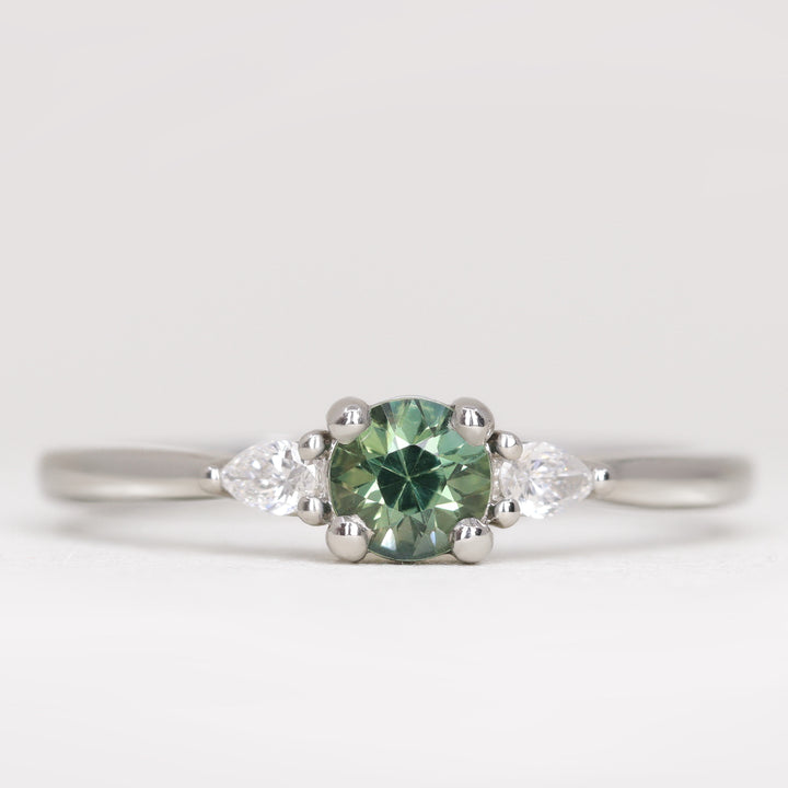 Elspeth - Round Brilliant Cut Teal Sapphire Trilogy Engagement Ring Engagement Rings - Made-to-Order