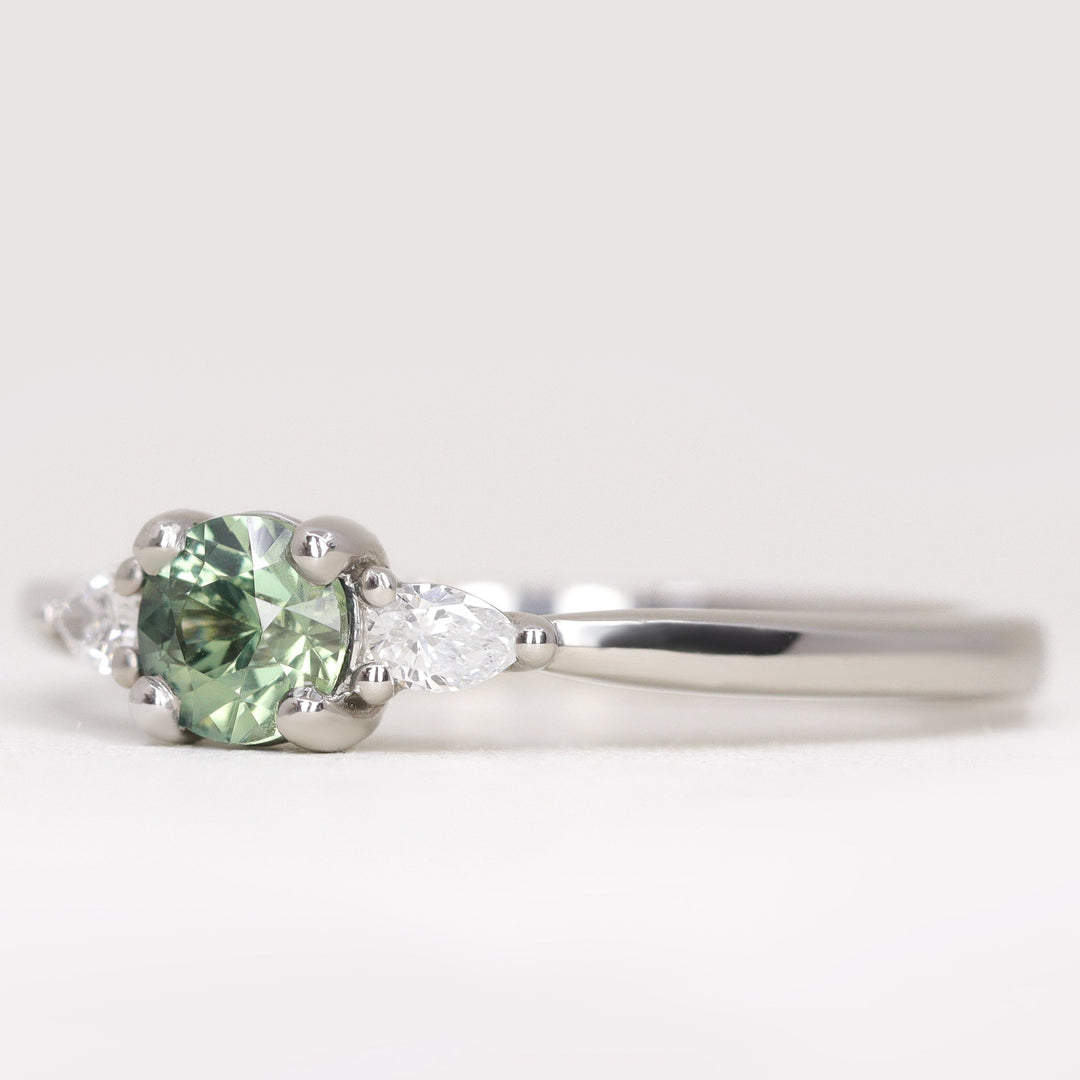 Elspeth - Round Brilliant Cut Teal Sapphire Trilogy Engagement Ring Engagement Rings - Made-to-Order
