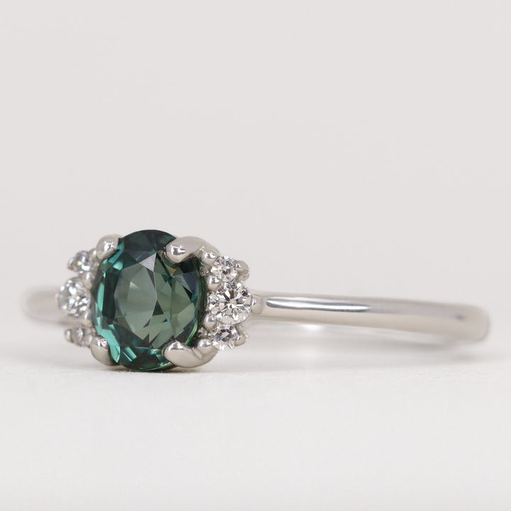 Persie - Oval Teal Sapphire and Diamond Cluster Engagement Ring Engagement Rings - Price On Application