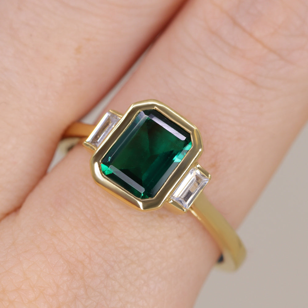 Phoebe - Octagon Cut Emerald Bezel Set Art Deco Trilogy Engagement Ring Engagement Rings - Price On Application