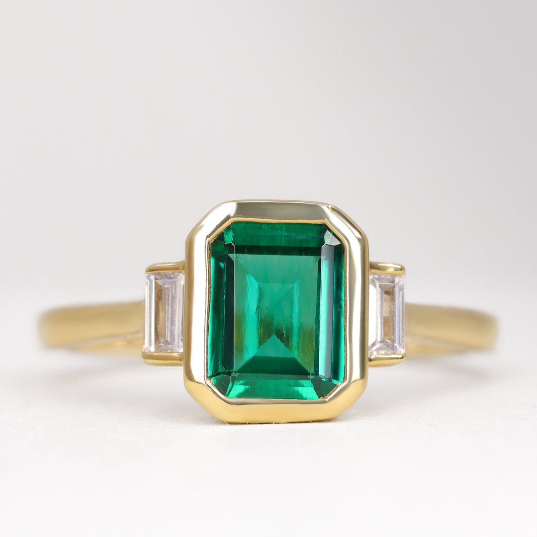 Phoebe - Octagon Cut Emerald Bezel Set Art Deco Trilogy Engagement Ring Engagement Rings - Price On Application