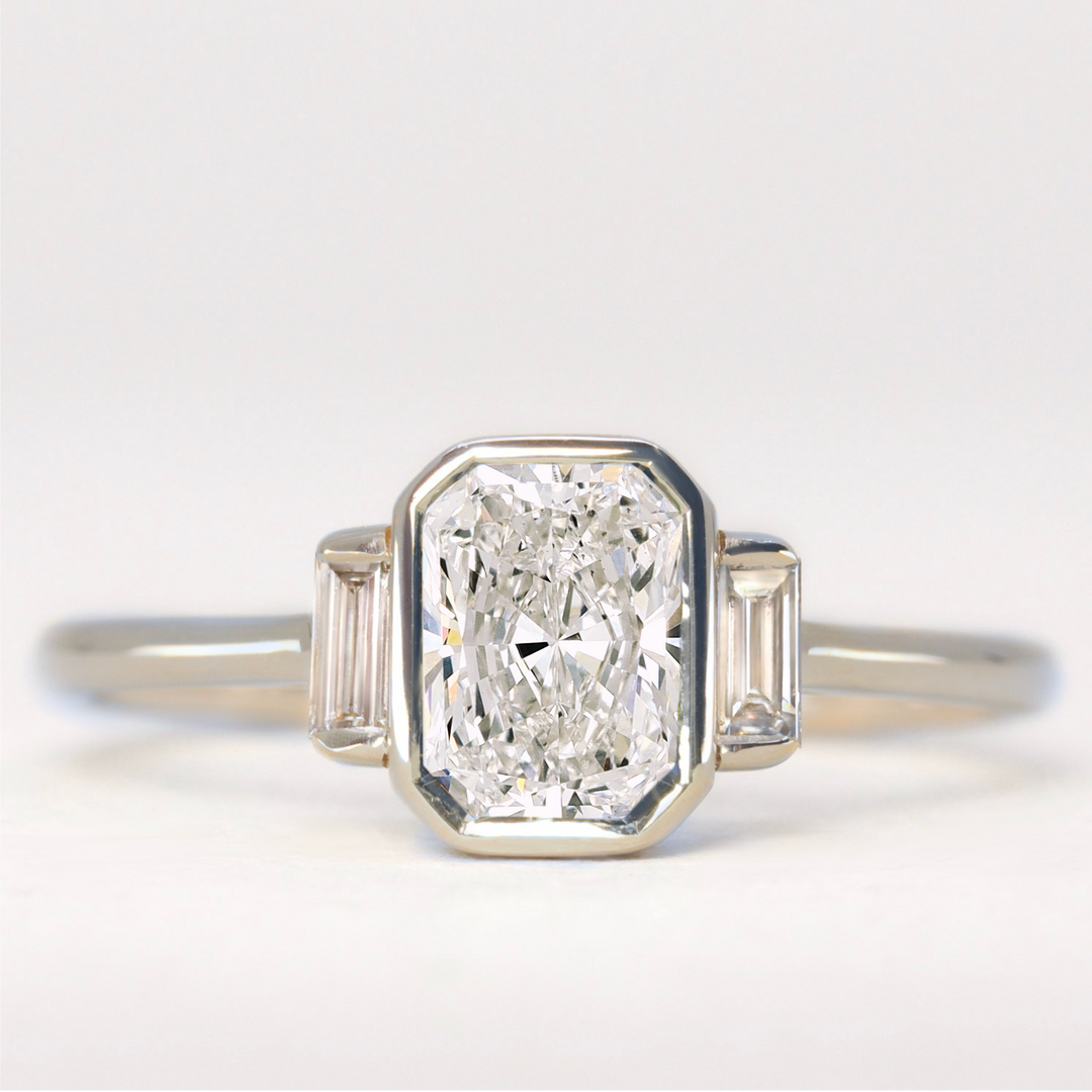 Phoebe - Radiant Cut Diamond Bezel Set Trilogy Engagement Ring Setting