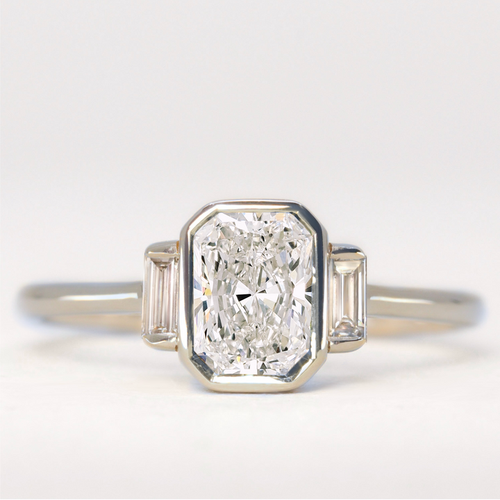 Phoebe - Radiant Cut Diamond Bezel Set Trilogy Engagement Ring Setting
