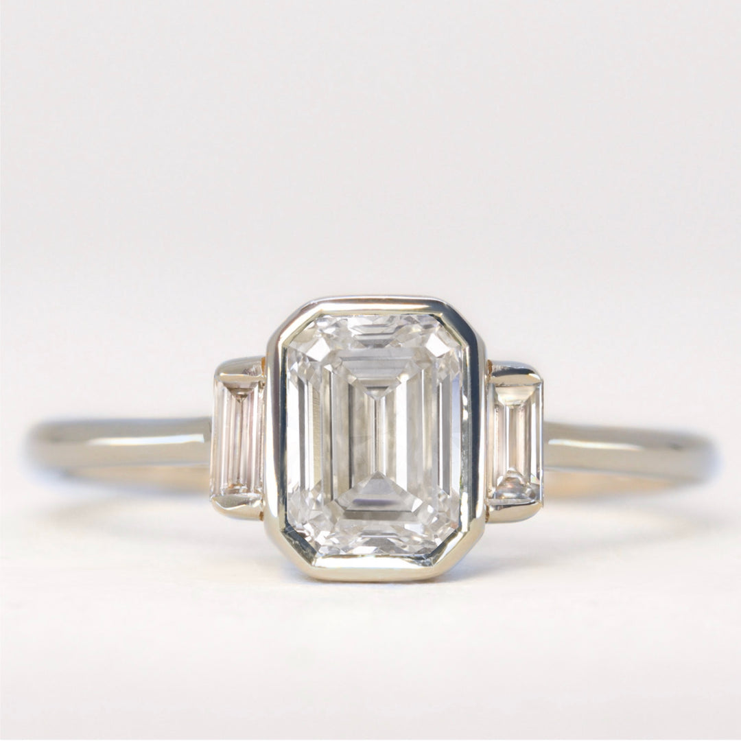 Phoebe - Emerald Cut Diamond Bezel Set Trilogy Engagement Ring Setting