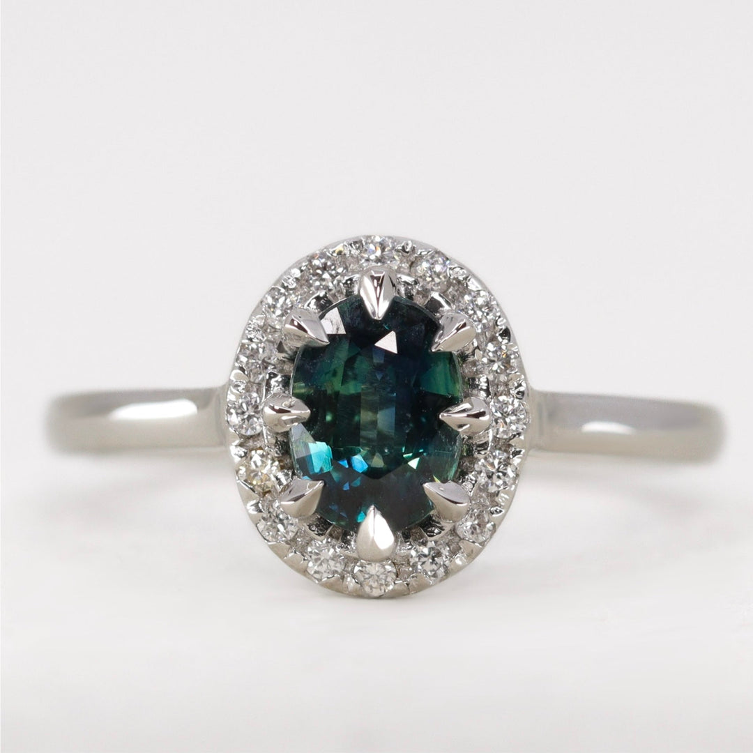 Charlotte - Oval Cut Teal Sapphire Hugging Halo Engagement Ring - Ready-to-Wear Engagement Rings - Ready-to-Ship