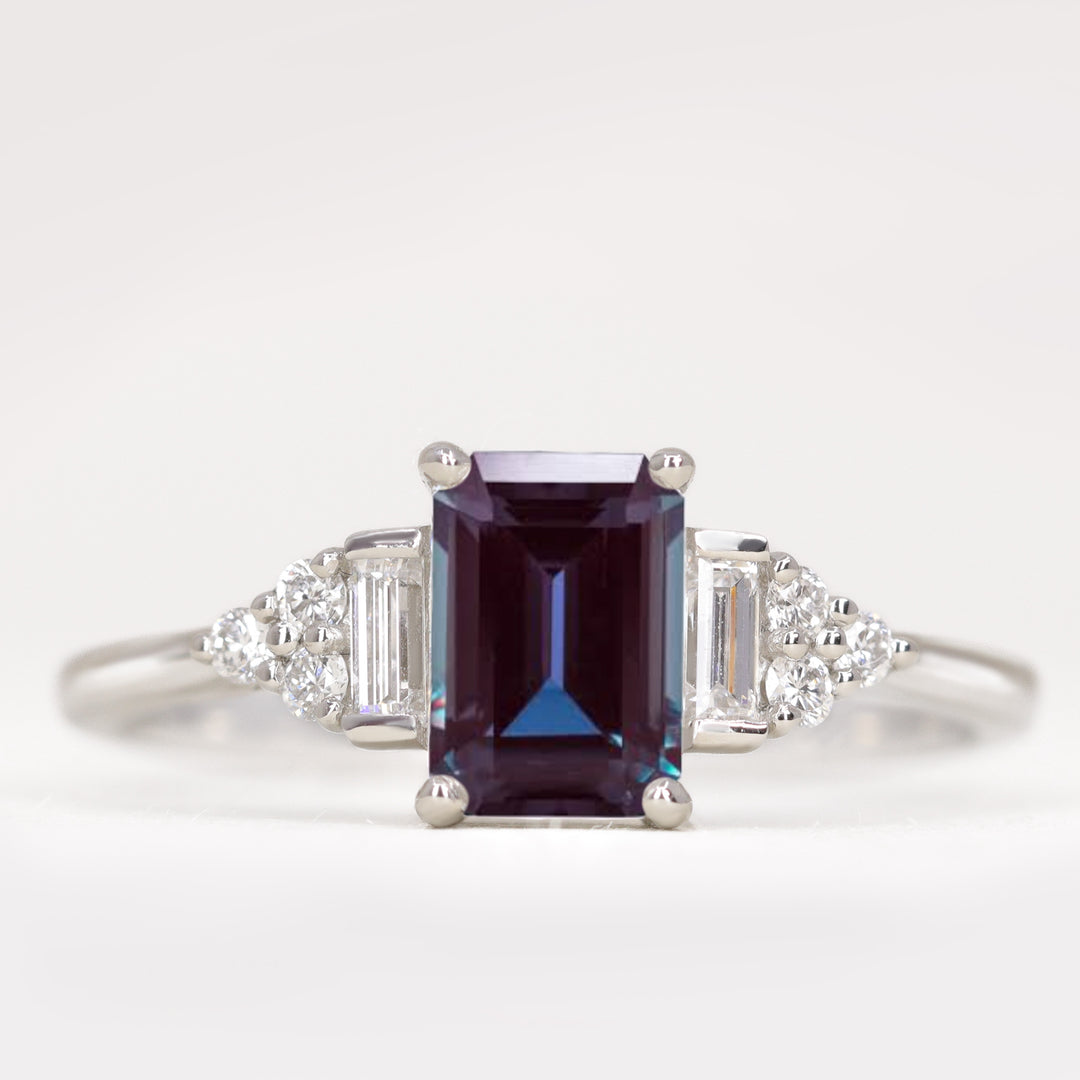 Art deco inspired emerald cut alexandrite and white diamond engagement ring