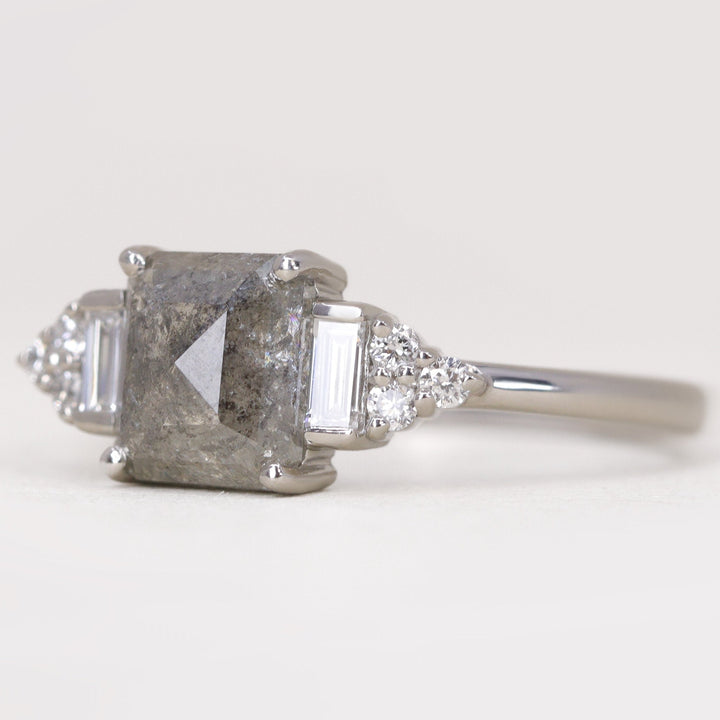 Art deco inspired engagement ring with salt and pepper diamond and white diamond side stones