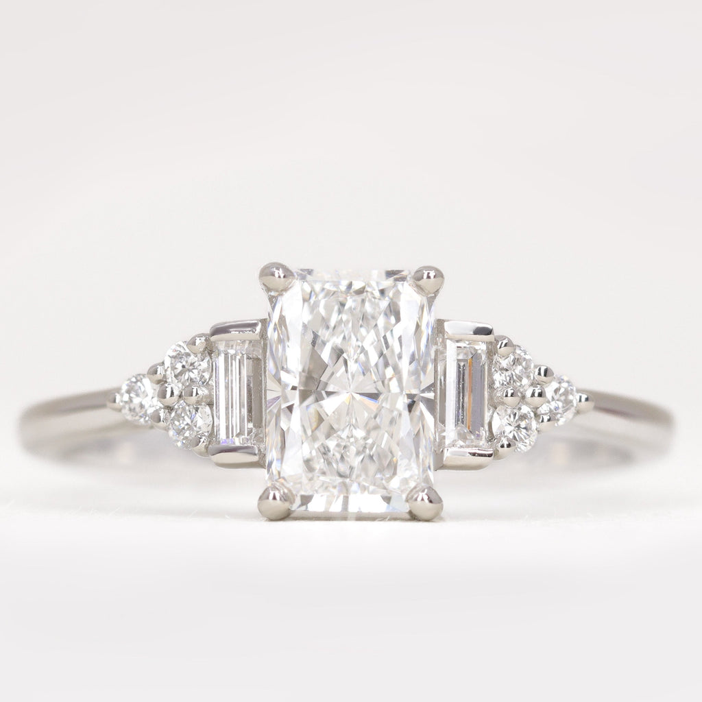 Art deco inspired radiant cut white diamond engagement ring