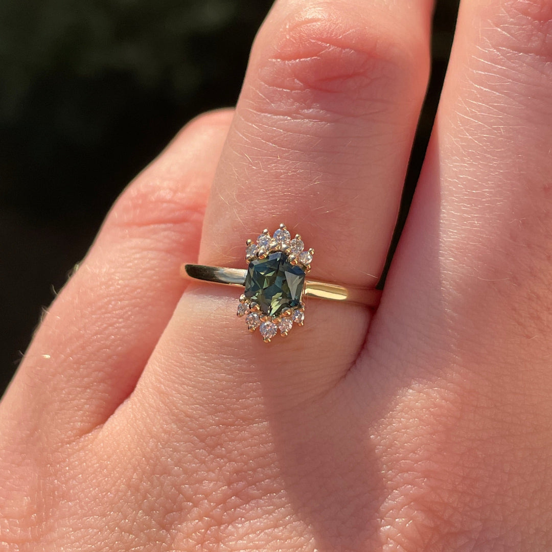 Unique hexagon cut green sapphire yellow gold engagement ring with white diamonds