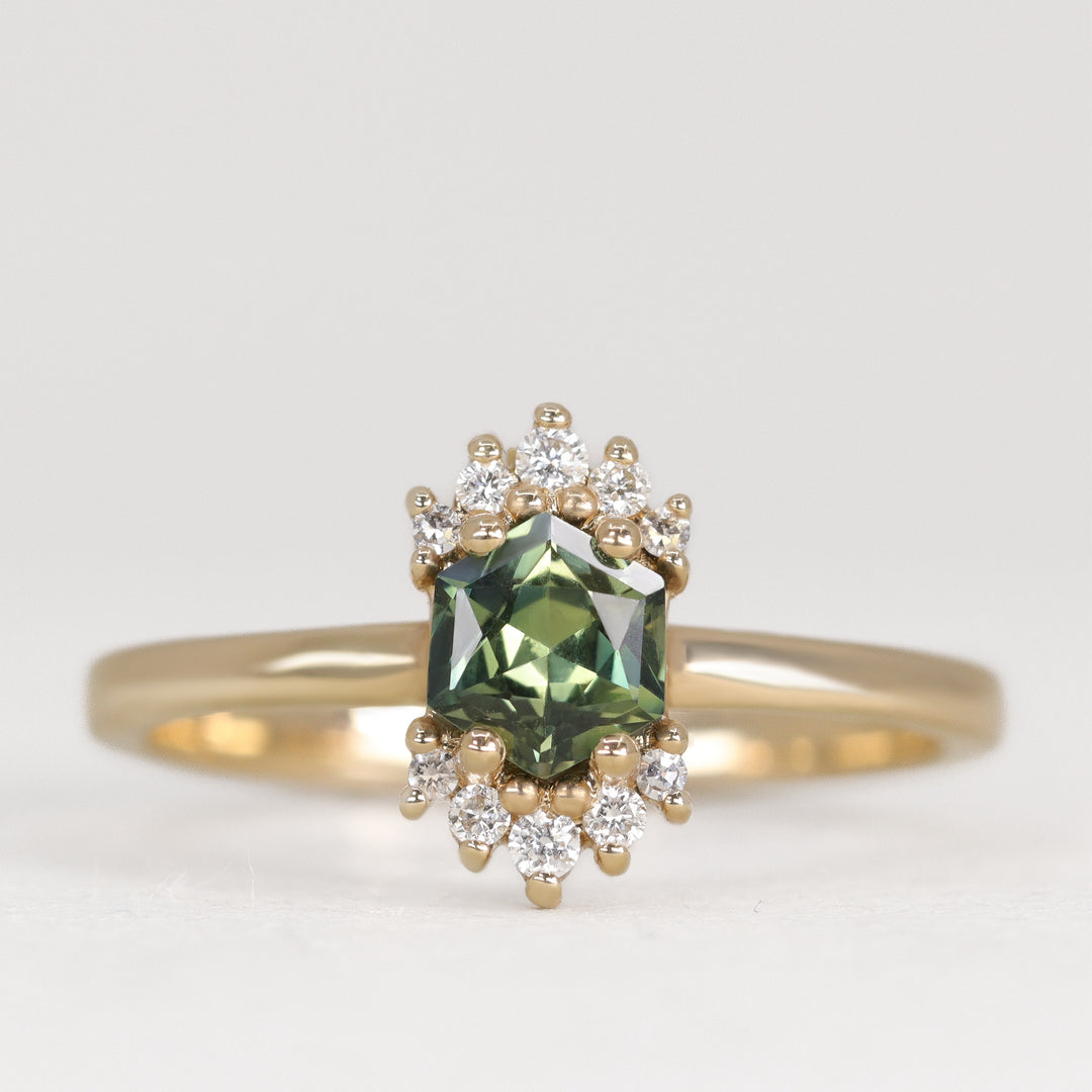 Unique hexagon cut green sapphire yellow gold engagement ring with white diamonds