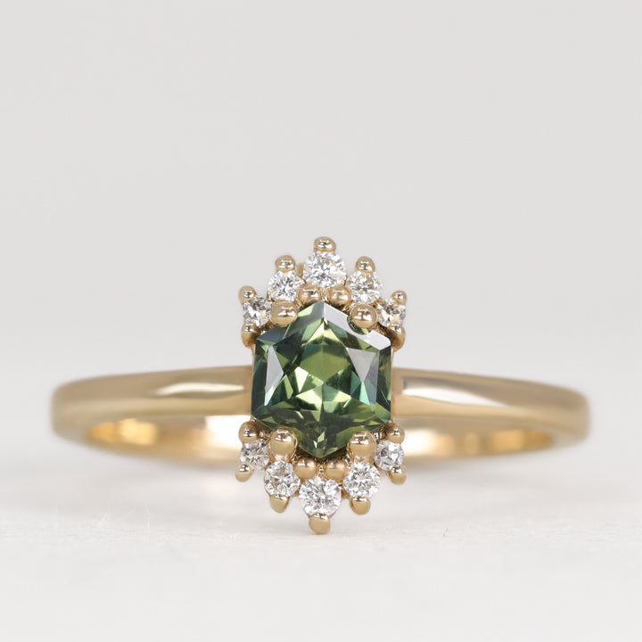 Unique hexagon cut green sapphire yellow gold engagement ring with white diamonds