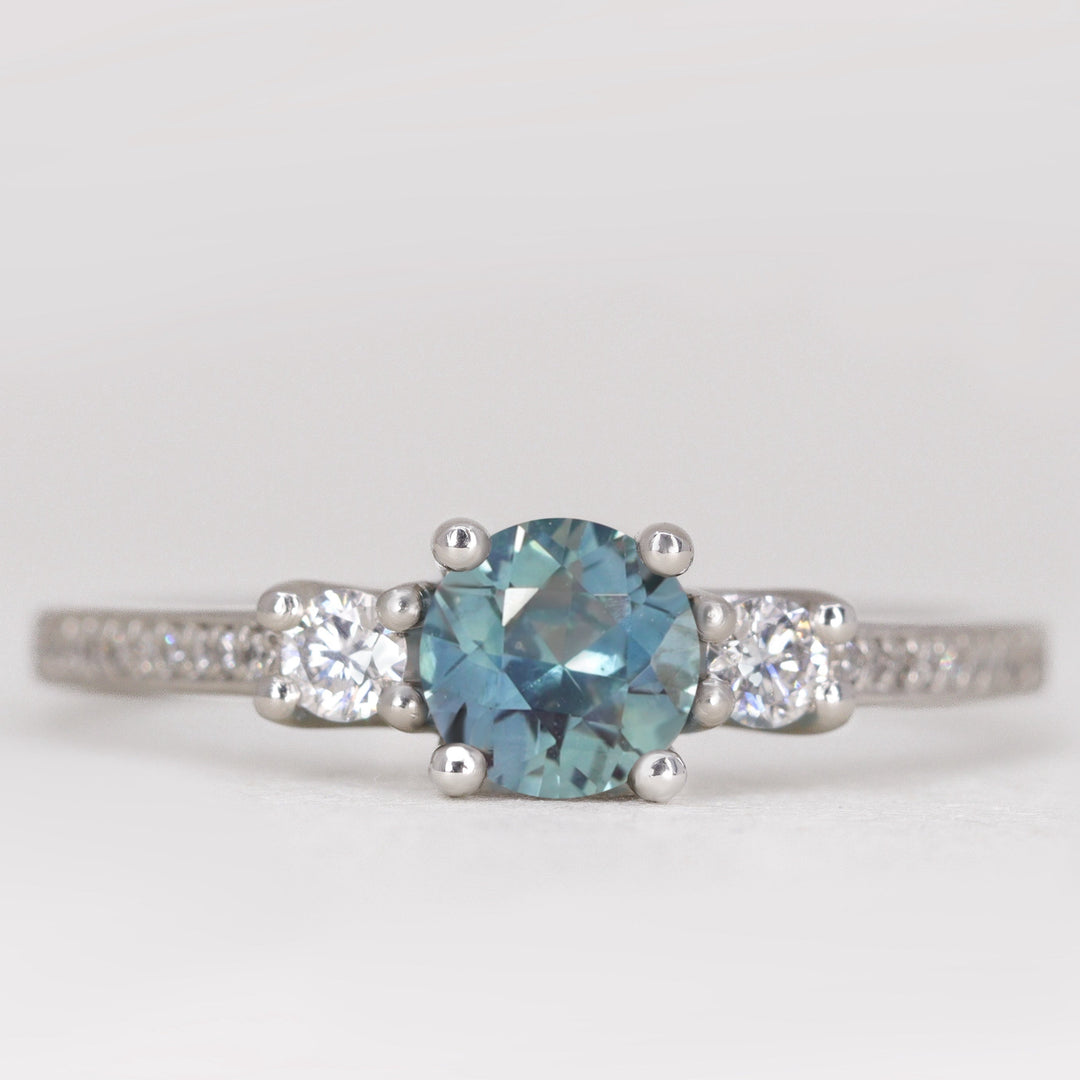 Callie - Round Brilliant Cut Teal Sapphire Delicate Trilogy Engagement Ring Engagement Rings - Made-to-Order