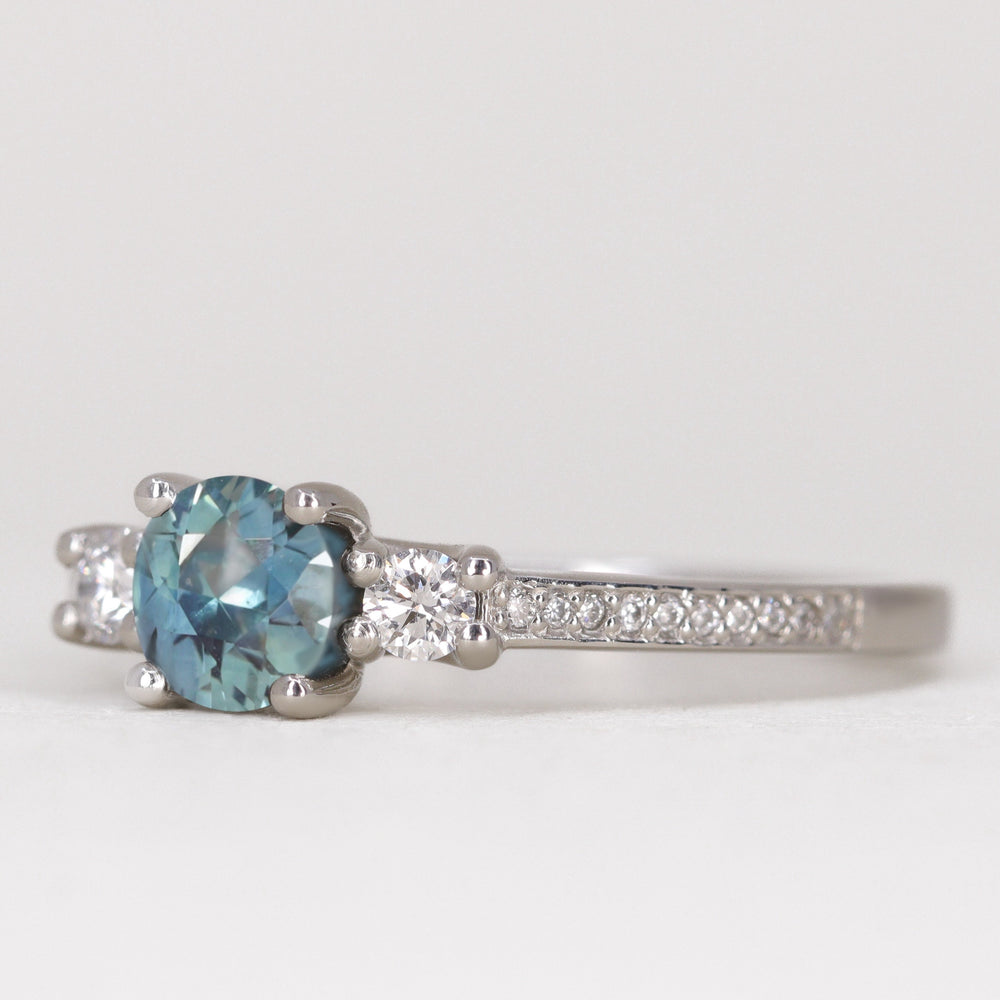 Callie - Round Brilliant Cut Teal Sapphire Delicate Trilogy Engagement Ring Engagement Rings - Made-to-Order