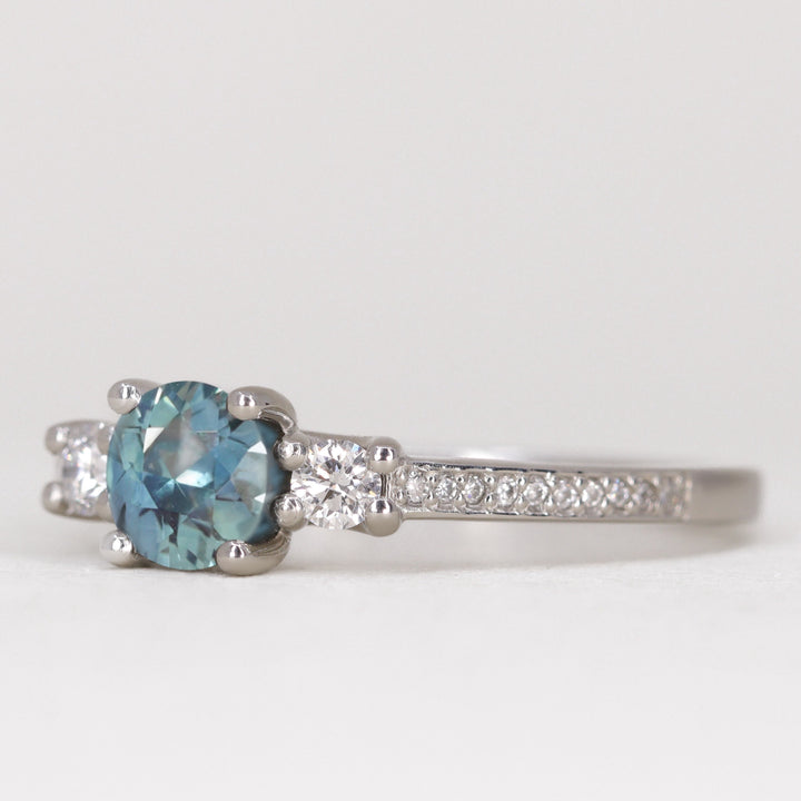 Callie - Round Brilliant Cut Teal Sapphire Delicate Trilogy Engagement Ring Engagement Rings - Made-to-Order