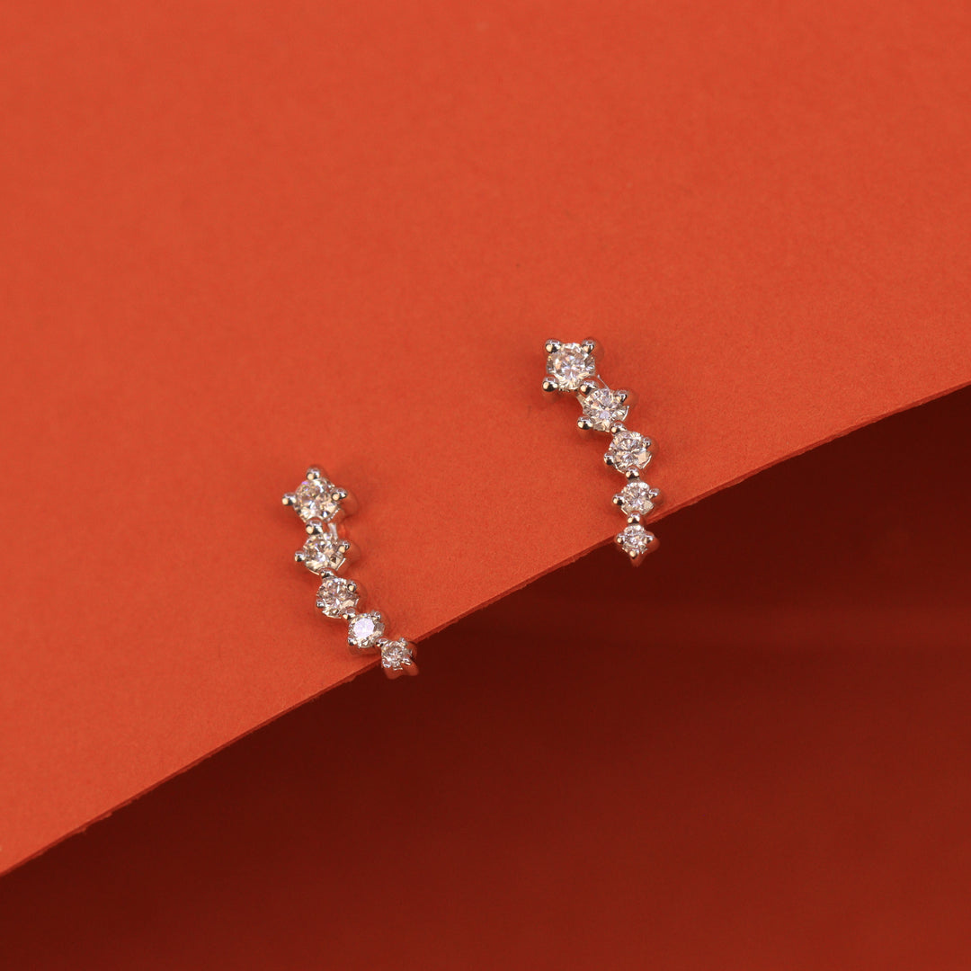 Constellation climber style diamond earrings