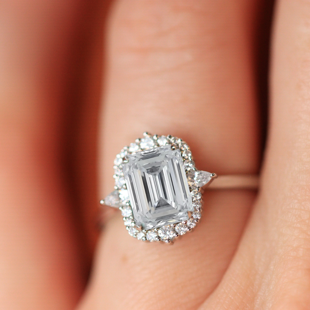 Cordelia - Emerald Cut Lab Grown Diamond Graduated Halo Engagement Ring