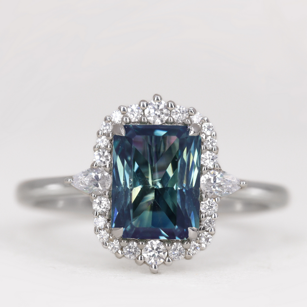 Cordelia - Radiant Cut Teal Sapphire Graduated Halo Engagement Ring Engagement Rings - Price On Application