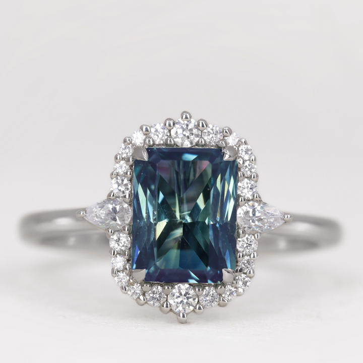 Cordelia - Radiant Cut Teal Sapphire Graduated Halo Engagement Ring