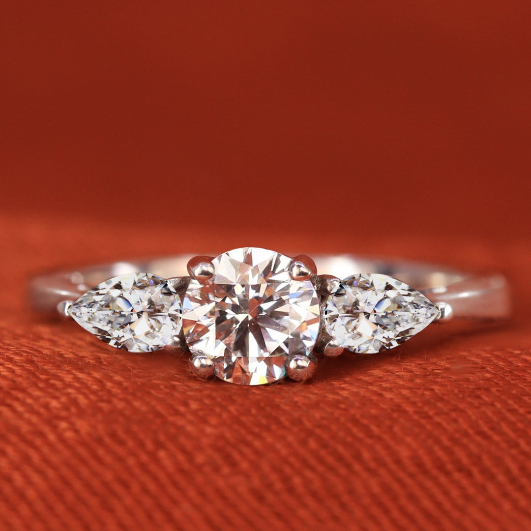 Diamond trilogy engagement ring