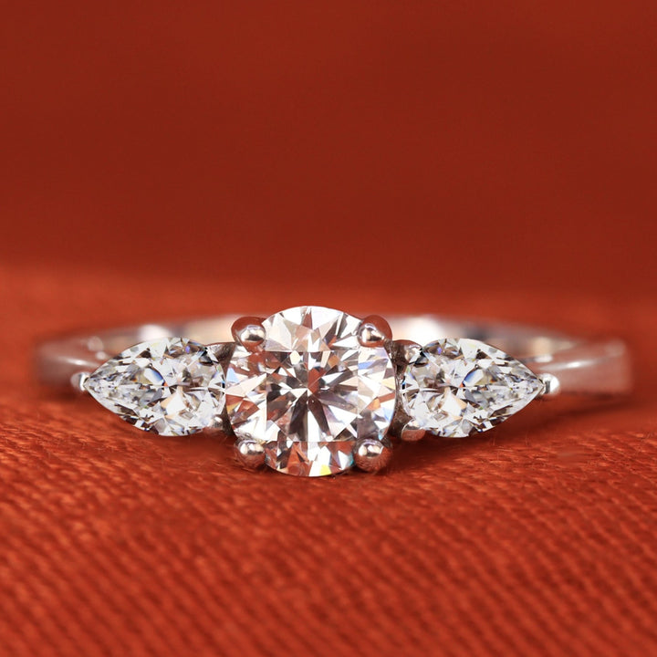 Diamond trilogy engagement ring