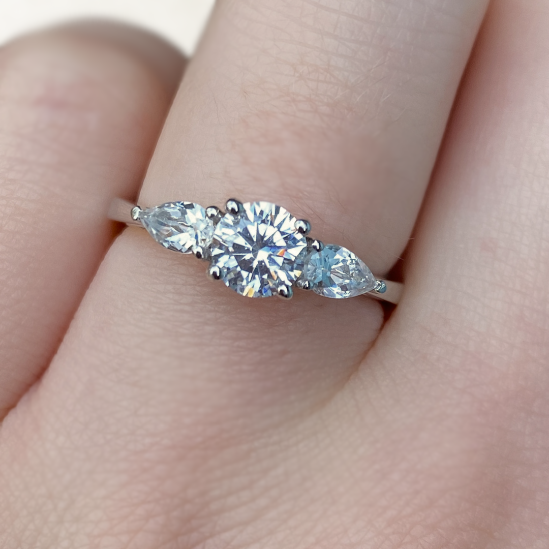 Diamond trilogy engagement ring 