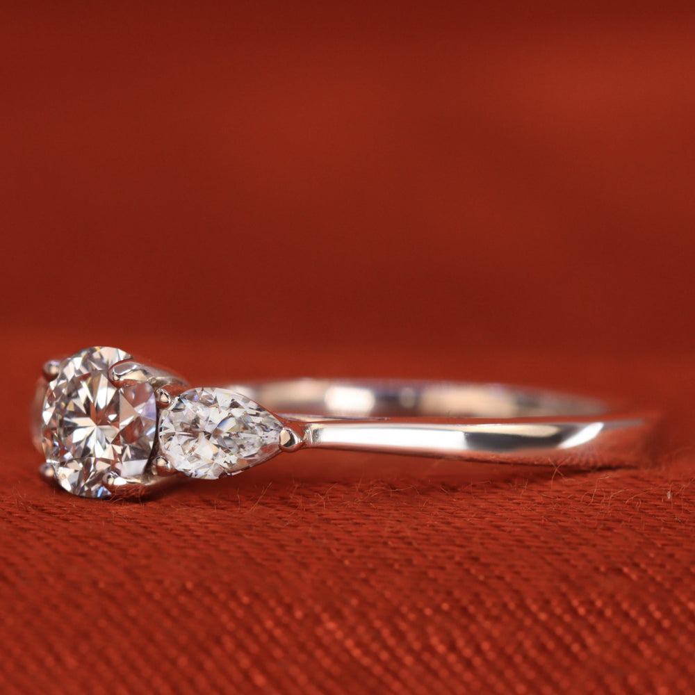 Diamond trilogy engagement ring platinum