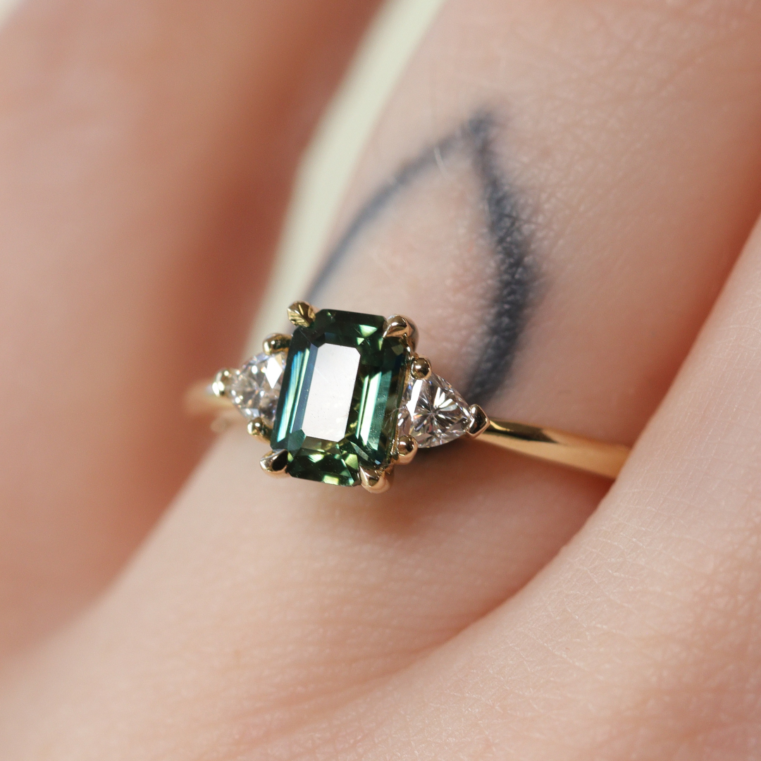 Delphine - Emerald Cut Teal Sapphire Trilogy Engagement Ring - Ready-to-Wear
