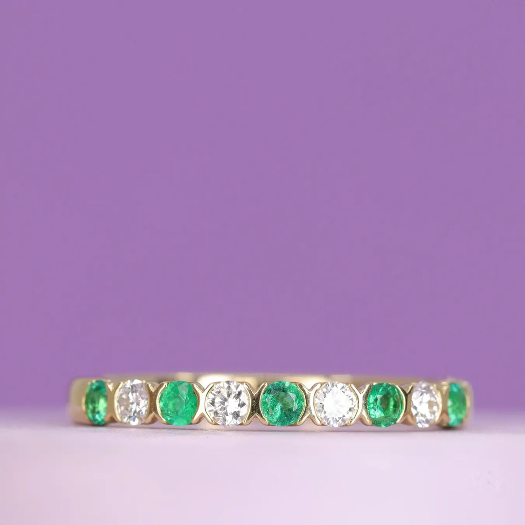 Bespoke diamond and emerald wedding ring