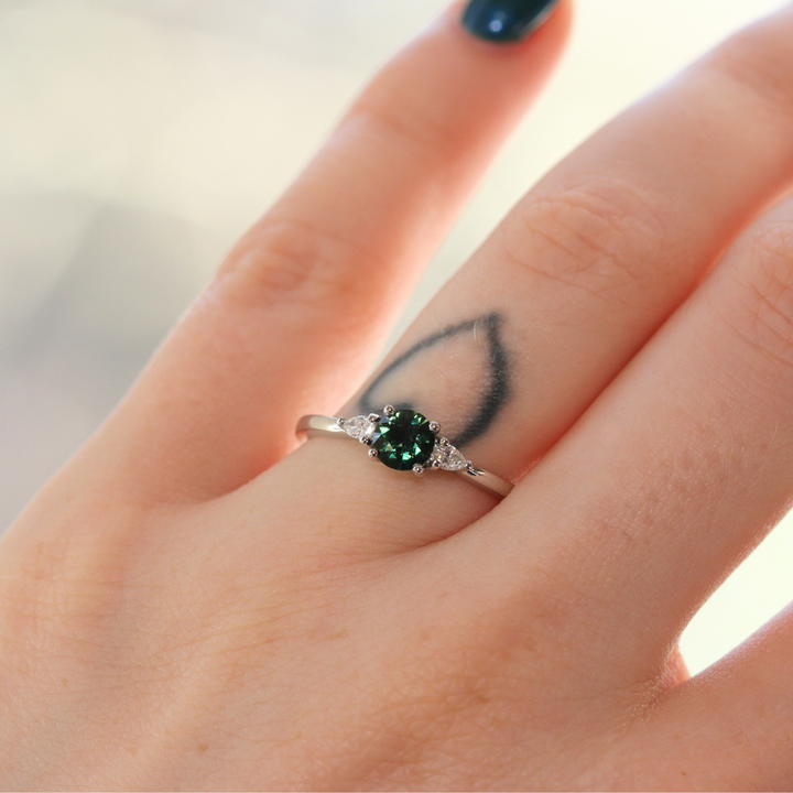 Elspeth - Round Cut Colour Change Teal Sapphire Trilogy Engagement Ring - Ready-to-Wear