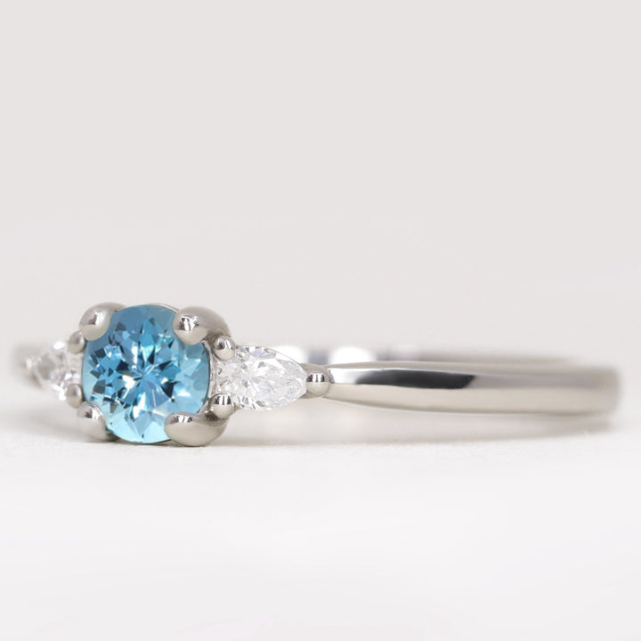 Aquamarine and lab grown diamond platinum engagement ring