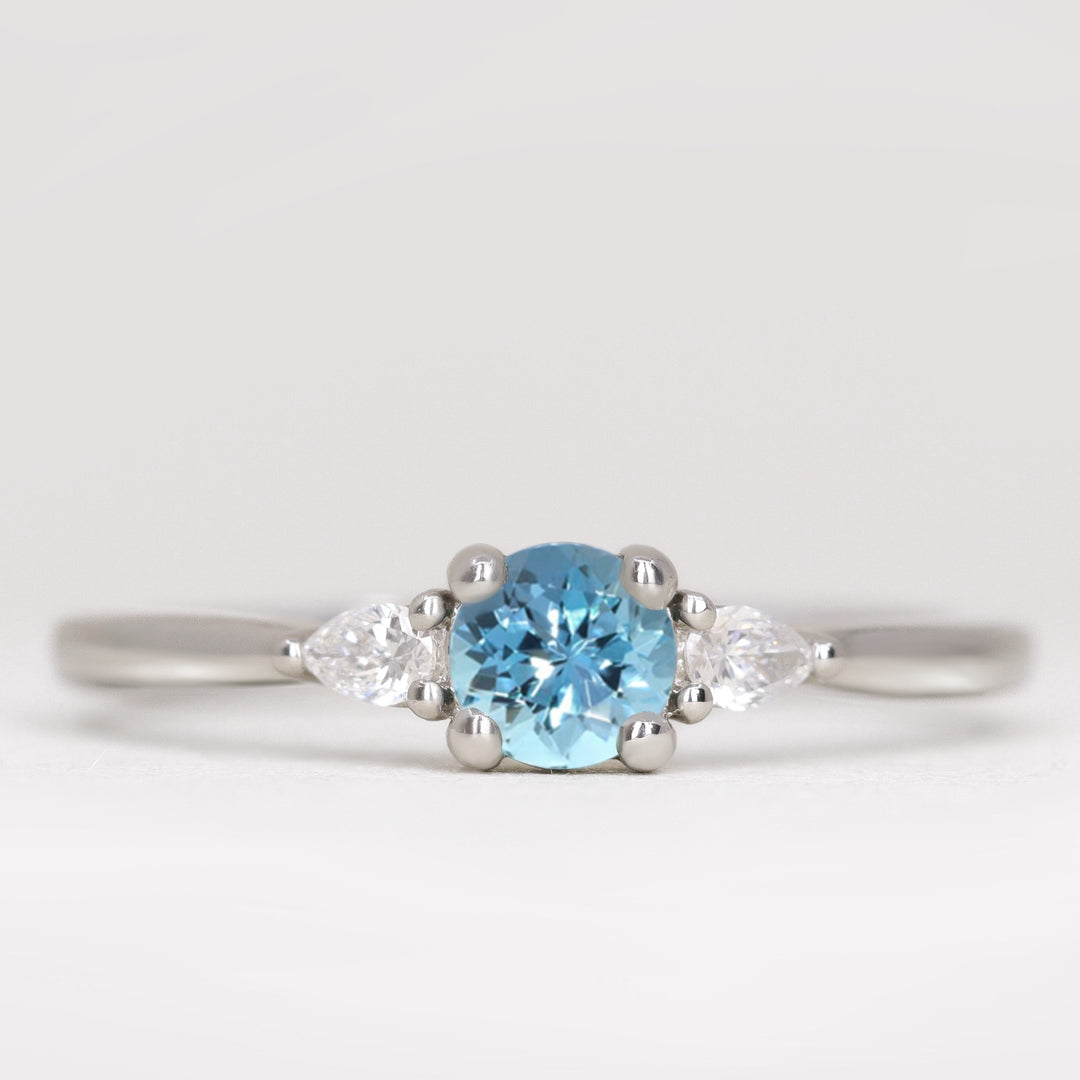 Aquamarine and lab grown diamond platinum engagement ring