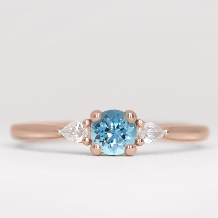 Unique aquamarine and lab grown diamond engagement ring in rose gold