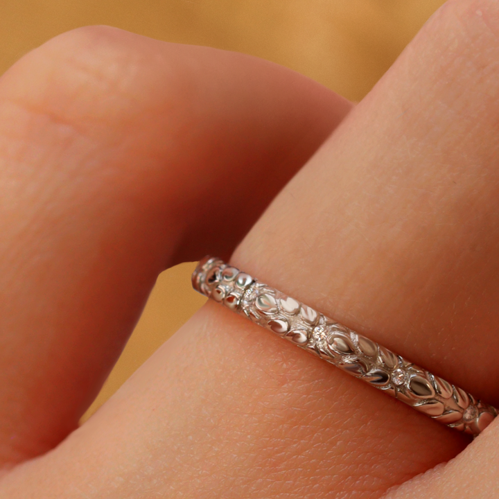 Leaf inspired pattern wedding ring with white diamonds 