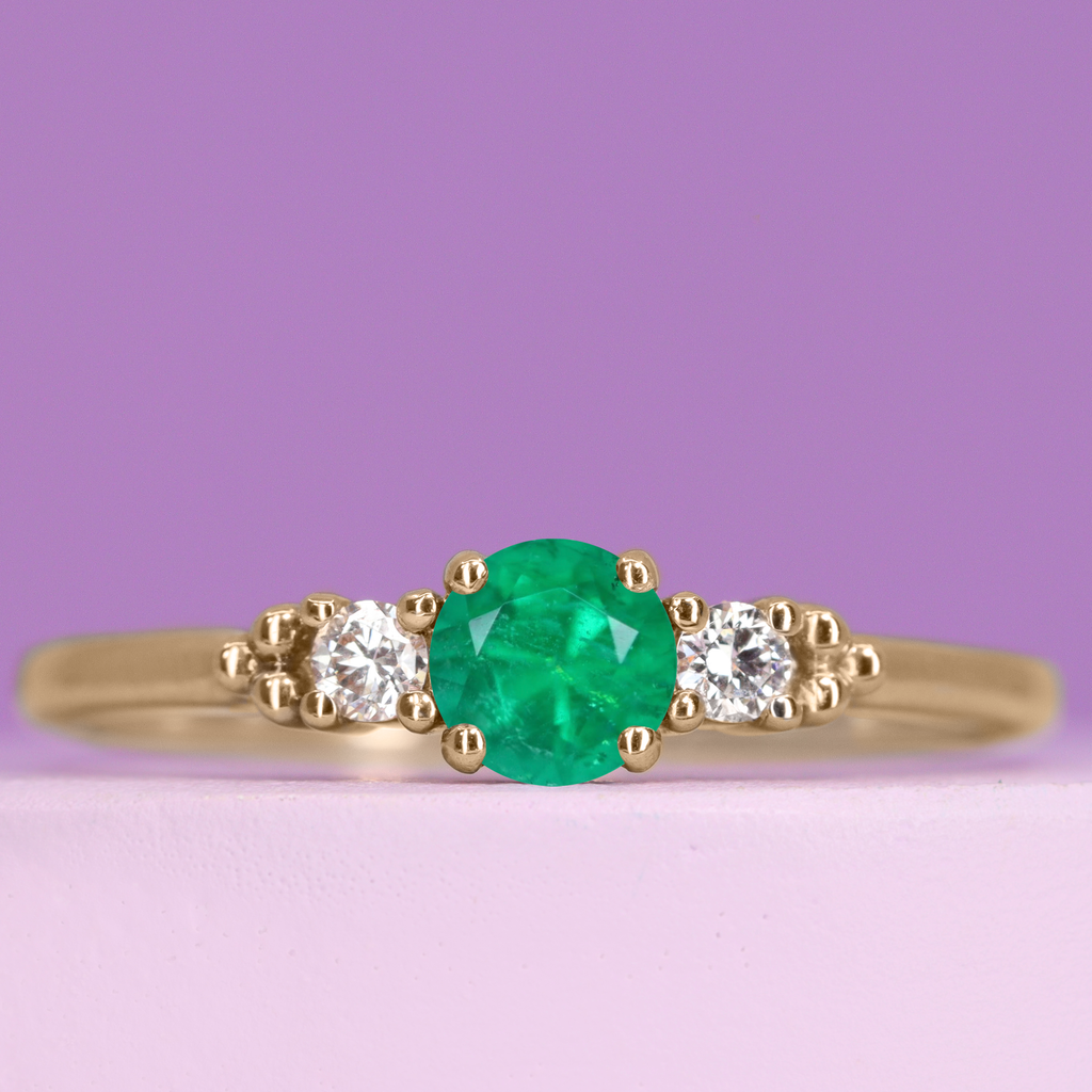 Natalia - Round Brilliant Cut Emerald and Diamond Delicate Trilogy Engagement Ring - Made-to-Order