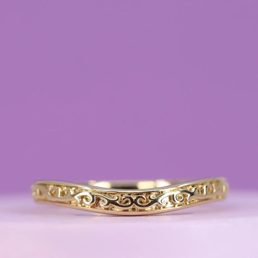 Gold engraved wedding ring