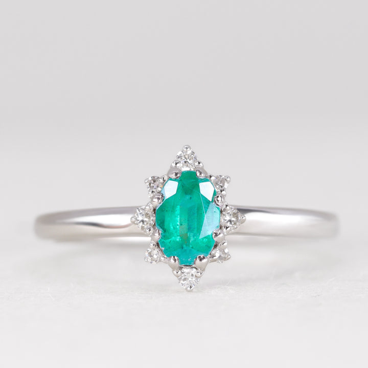 Mabel - Oval Cut Emerald and Diamond Halo Engagement Ring