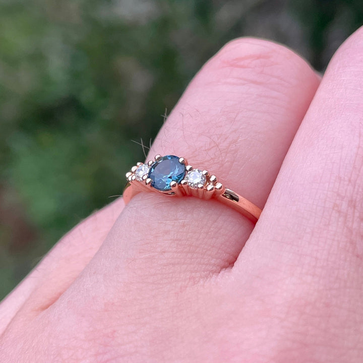 Natalia - Round Brilliant Cut Montana Sapphire and Lab Grown Diamond Trilogy Engagement Ring in Rose Gold - Ready-to-Wear