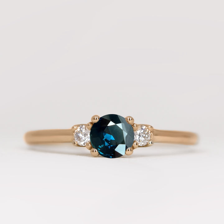 Millie - Round Brilliant Cut Teal Sapphire and Diamond Trilogy Engagement Ring