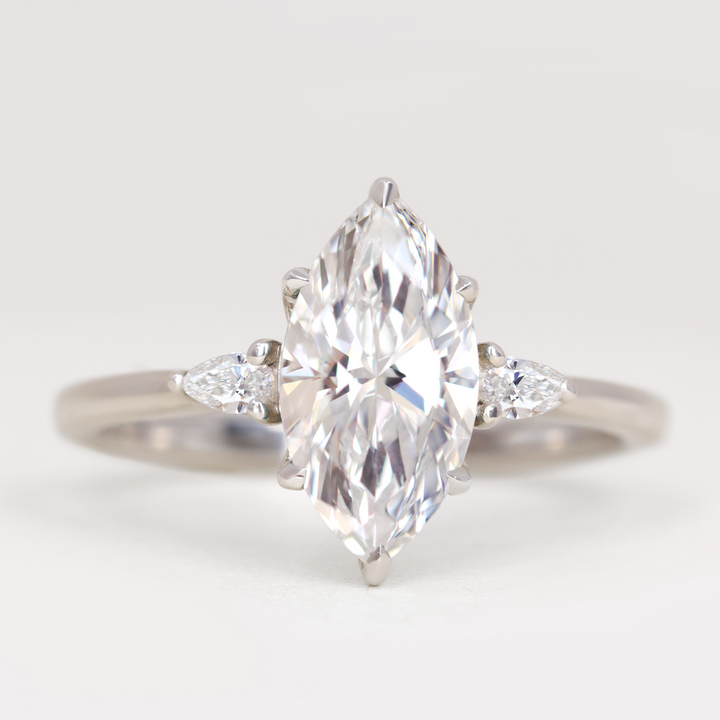 Elspeth - Trilogy Engagement Ring with Pear Cut Side Stones Setting