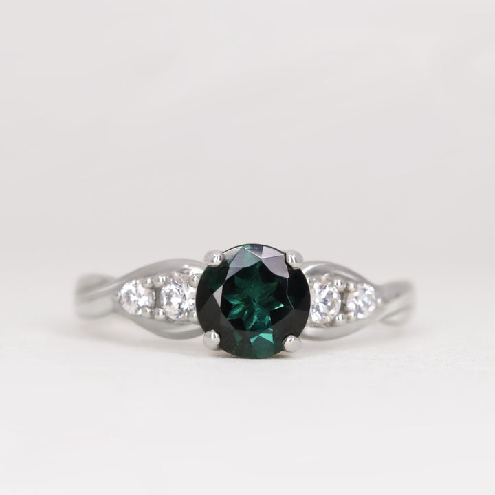 Corinne - Round Brilliant Cut Teal Sapphire Five Stone Engagement Ring