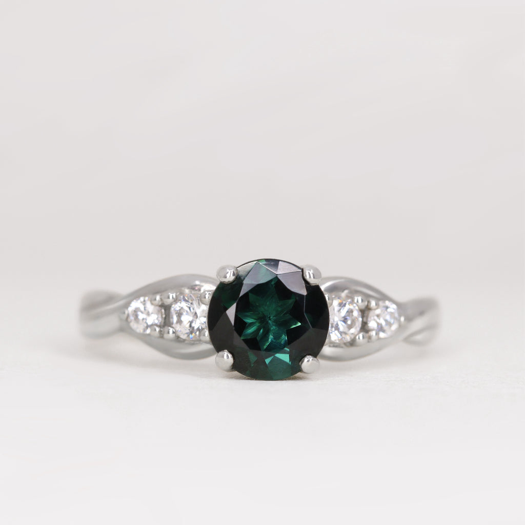 Corinne - Round Brilliant Cut Teal Sapphire Five Stone Engagement Ring