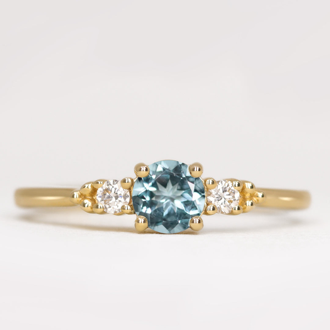 Natalia - Round Cut Aquamarine and Diamond Trilogy Engagement Ring