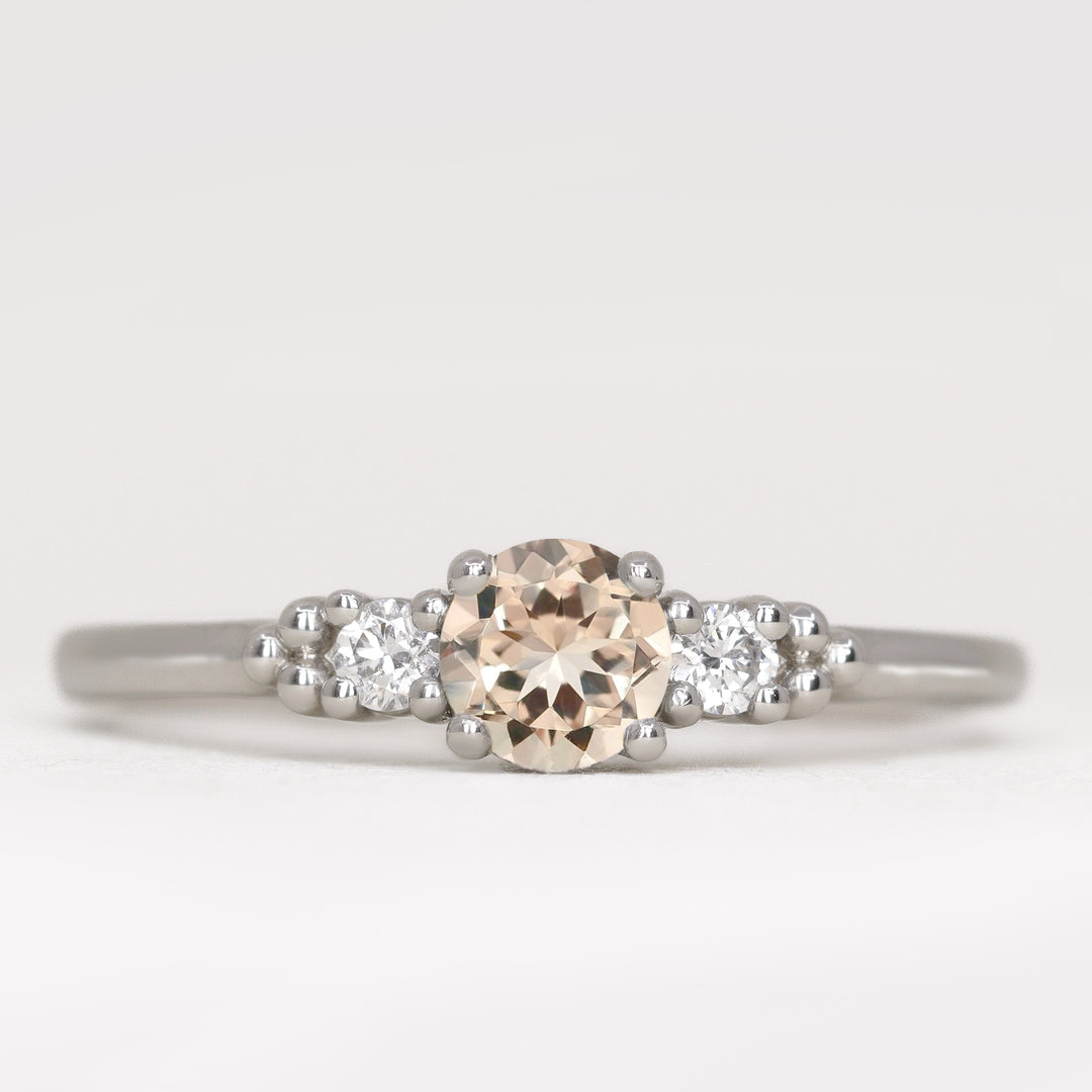 Natalia - Round Cut Morganite and Diamond Trilogy Engagement Ring