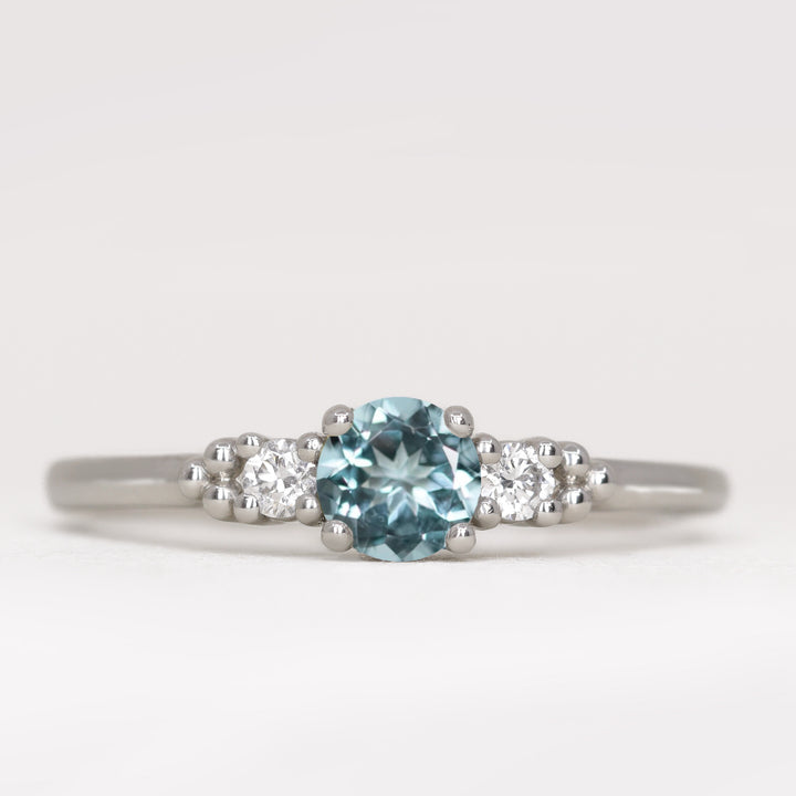 Natalia - Round Cut Aquamarine and Diamond Trilogy Engagement Ring