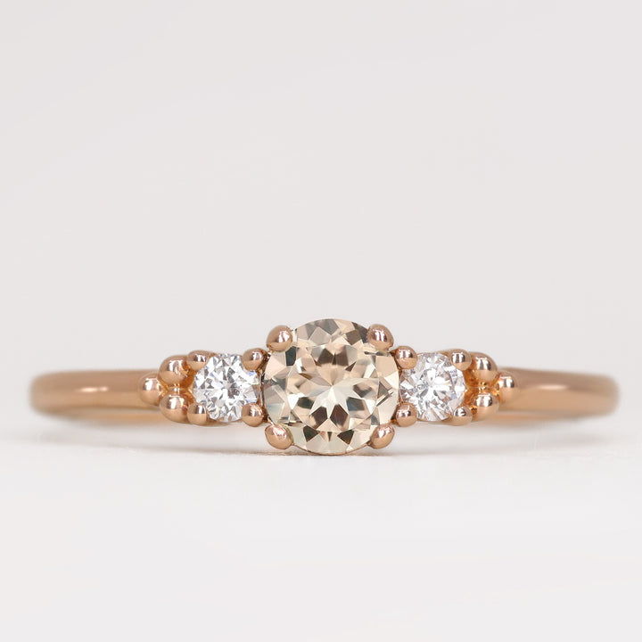 Natalia - Round Cut Morganite and Diamond Trilogy Engagement Ring