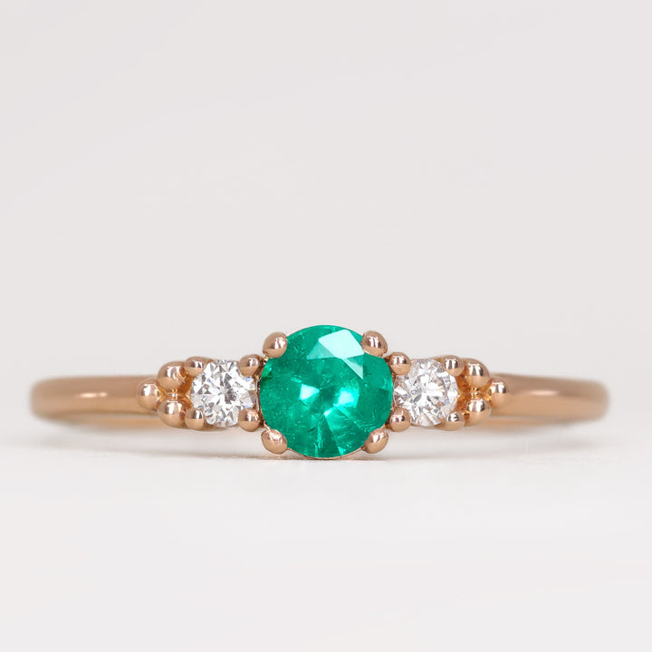 Natalia - Round Cut Emerald and Diamond Trilogy Engagement Ring