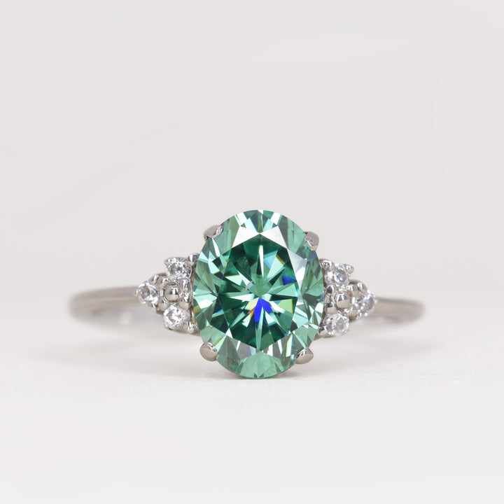 Henrietta - Oval Cut Teal Moissanite Cluster Engagement Ring