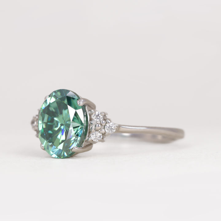 Henrietta - Oval Cut Teal Moissanite Cluster Engagement Ring