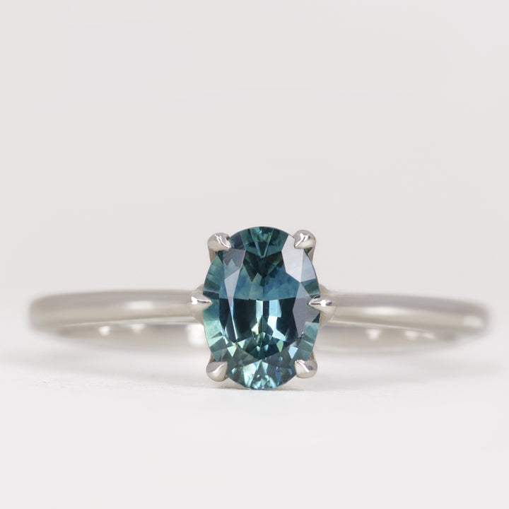 Raine - Oval Cut Teal Sapphire Lotus Flower Solitaire Engagement Ring